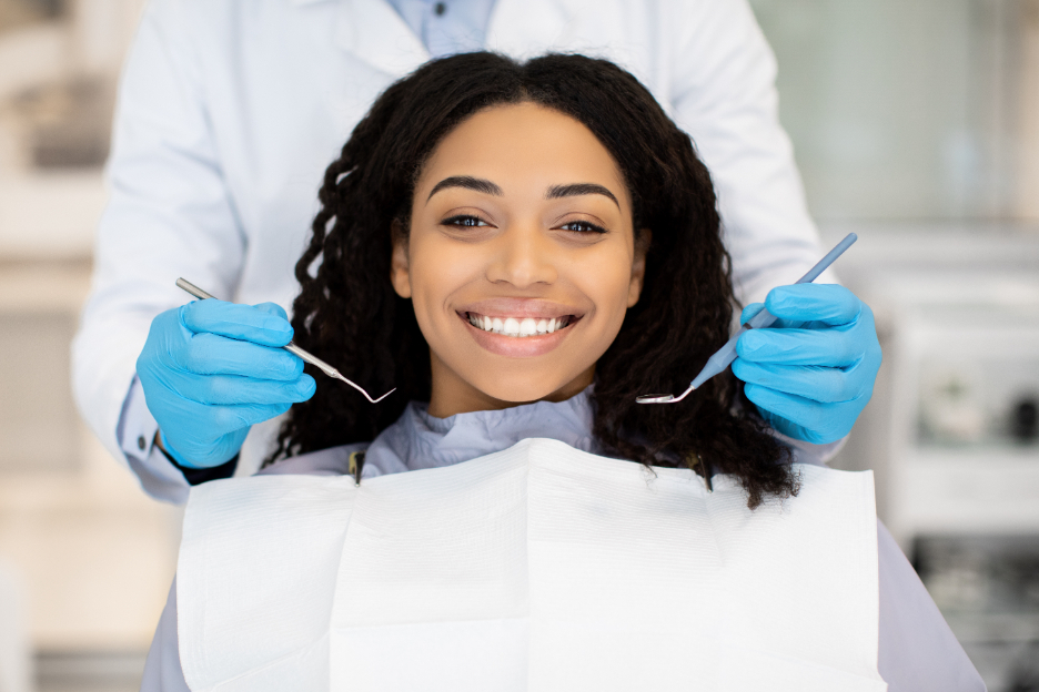 woman at the dentist smiling Botox Buford Dentist NACCID (770) 932-1115