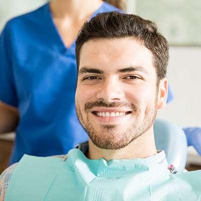 Man smiling after a dental treatment